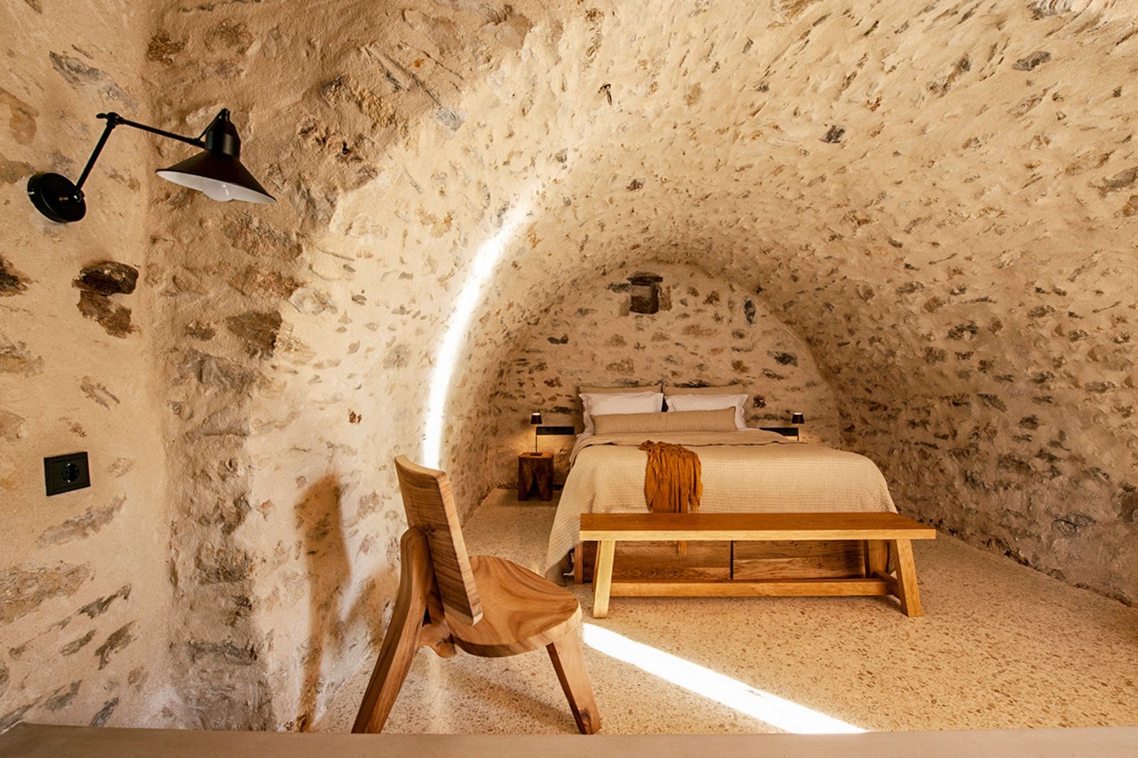 Vaulted stone bedroom with timber bed, Vamvakou Guest House, Laconia
